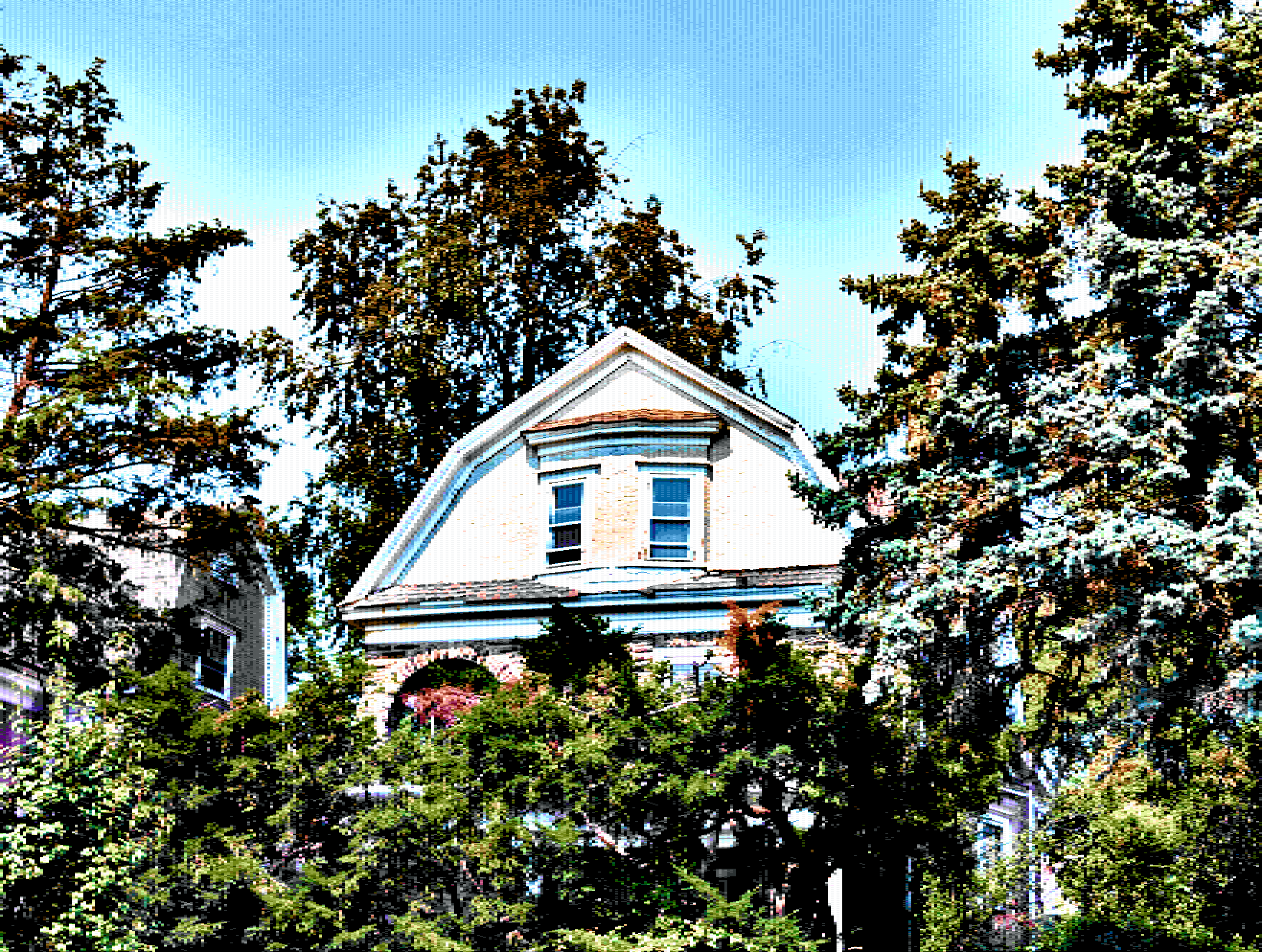 A vibrant, pixelated, highly edited image captures a suburban scene dominated by lush green foliage and a light-colored house partially visible through the trees.

**Foreground and Midground:**
The foreground is filled with dense, dark green leaves and branches of various trees, creating a rich, textured canopy that frames the scene. The foliage is abundant, suggesting a summer or late spring setting.

**The House:**
In the center-left, a two-story house is visible. It has light-colored siding (perhaps white or pale yellow) and a pitched roof. A prominent feature is a window visible on the upper floor. The house is nestled among the trees, suggesting it is somewhat secluded or surrounded by mature landscaping.

**Background:**
The background is dominated by more dense trees, creating a wall of green that suggests a heavily wooded neighborhood or a large yard. The lighting is bright, with a clear, light blue sky visible through the leaves, indicating a sunny day.

**Overall Impression:*